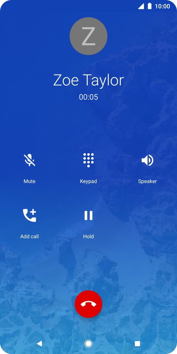 Press the end call icon.