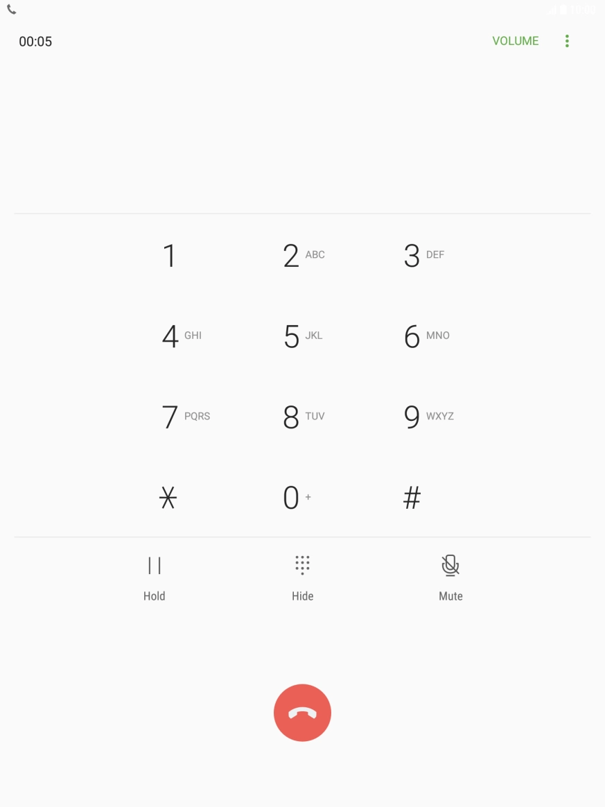 Press the end call icon.