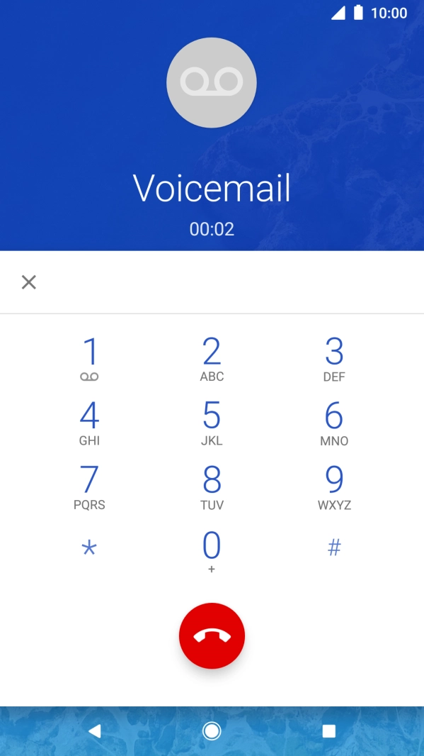 Press the end call icon.