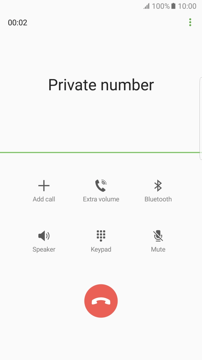 Press the end call icon.