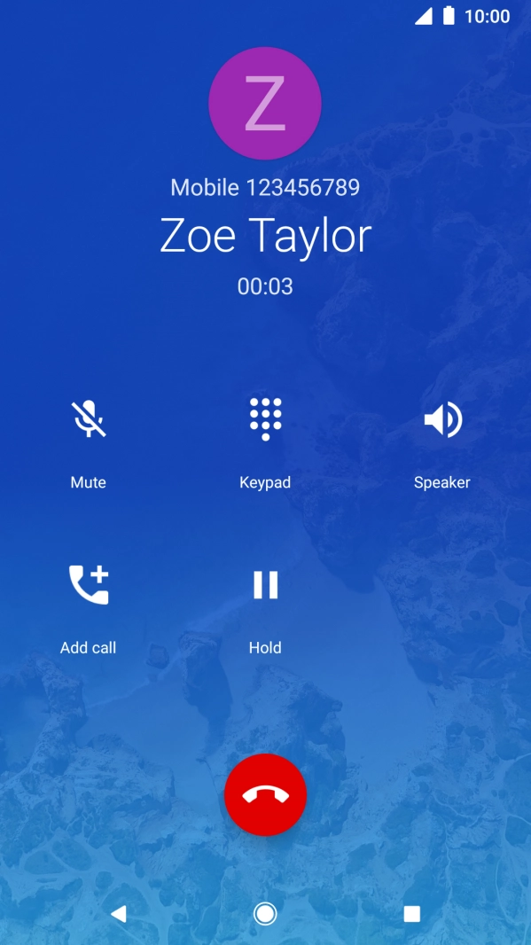 Press the end call icon.