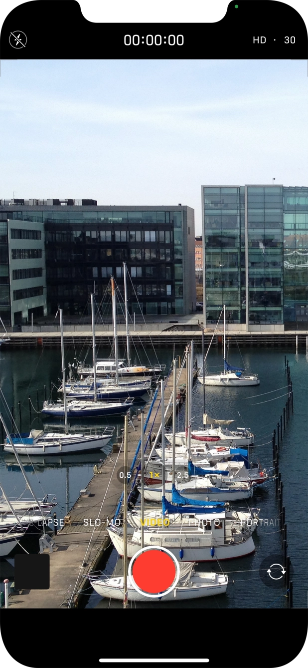 Slide your finger right or left on the screen to select PHOTO.