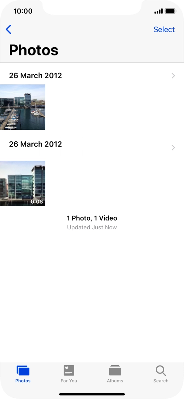 Go to the required folder and press the required picture or video clip.