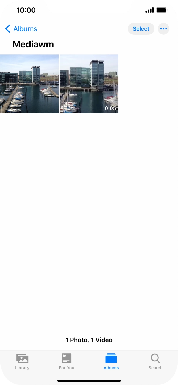 Go to the required folder and press the required picture or video clip.