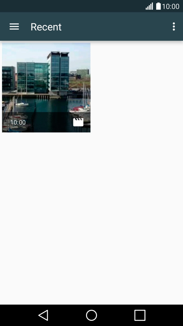 Slide your finger right starting from the left side of the screen.