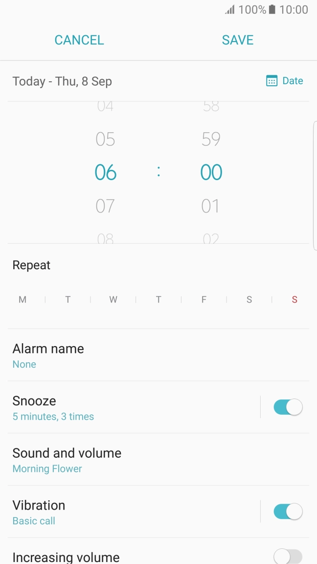 Slide your finger up or down on hours and minutes to select the alarm time.