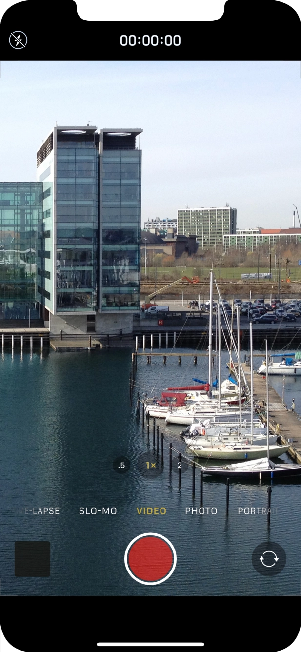 Slide your finger right or left on the screen to select PHOTO.