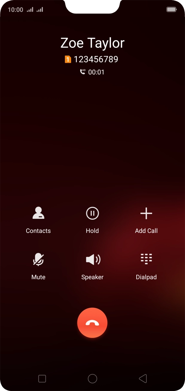 Press the end call icon.