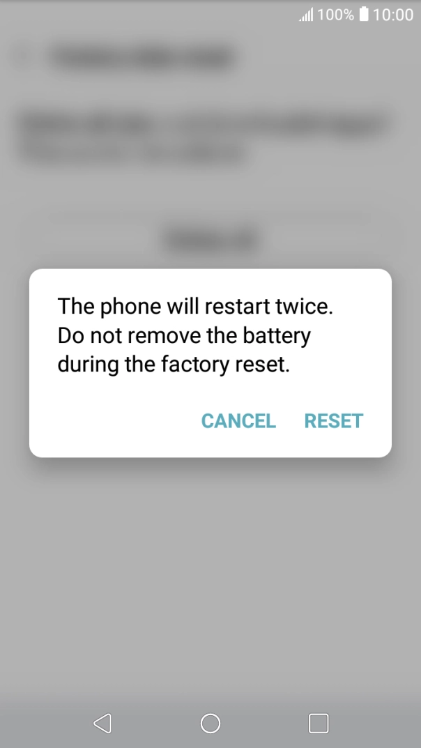 Press RESET. Wait a moment while the factory default settings are restored. 
Follow the instructions on the screen to set up your phone and prepare it for use.