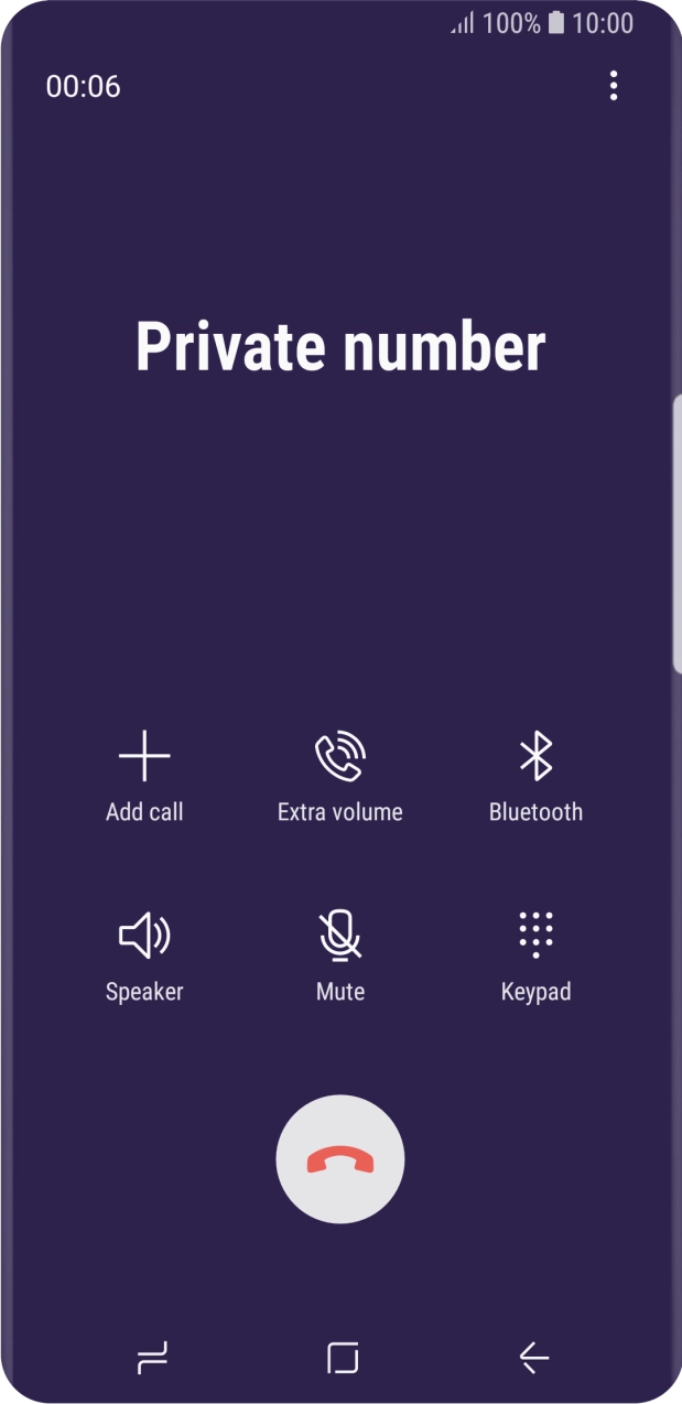 Press the end call icon.