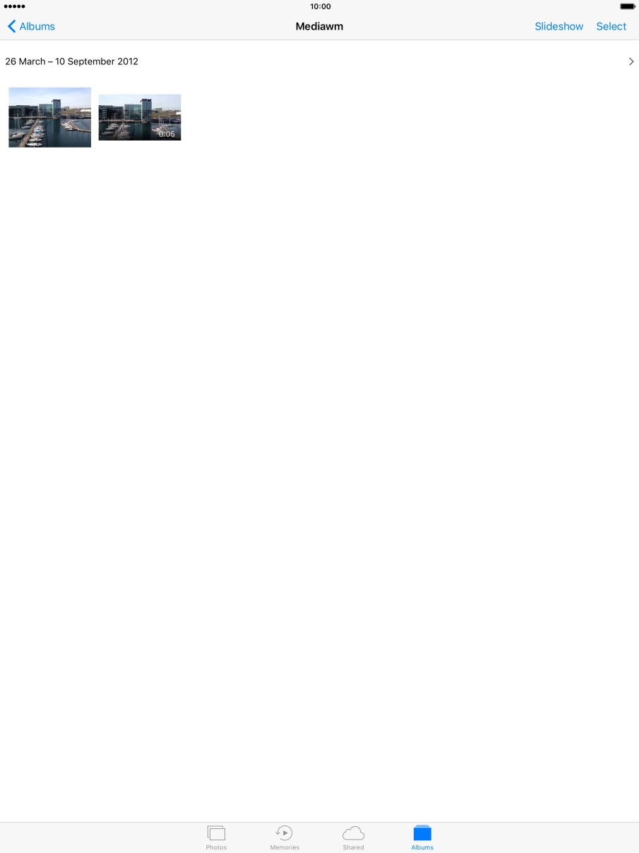 Go to the required folder and press the required picture or video clip.