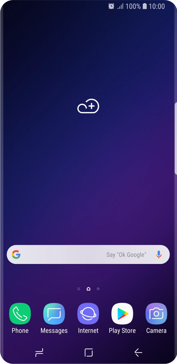 The alarm icon shows that the alarm is set.