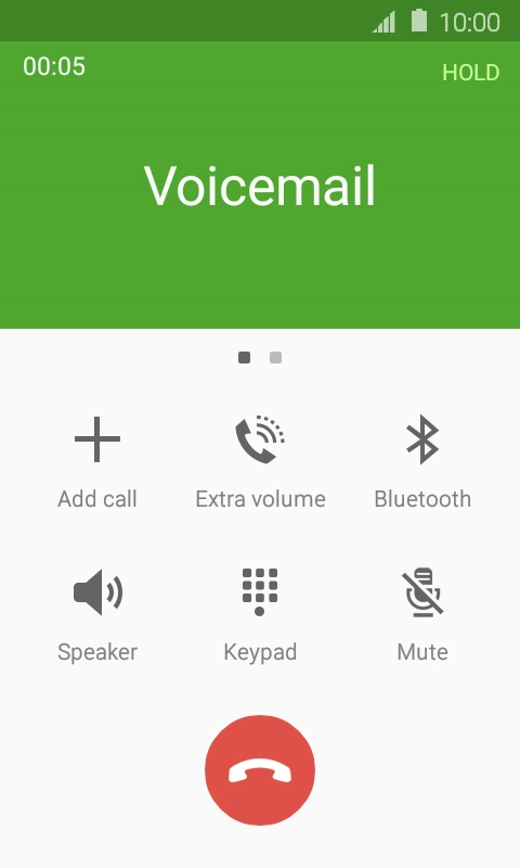 Press the end call icon.