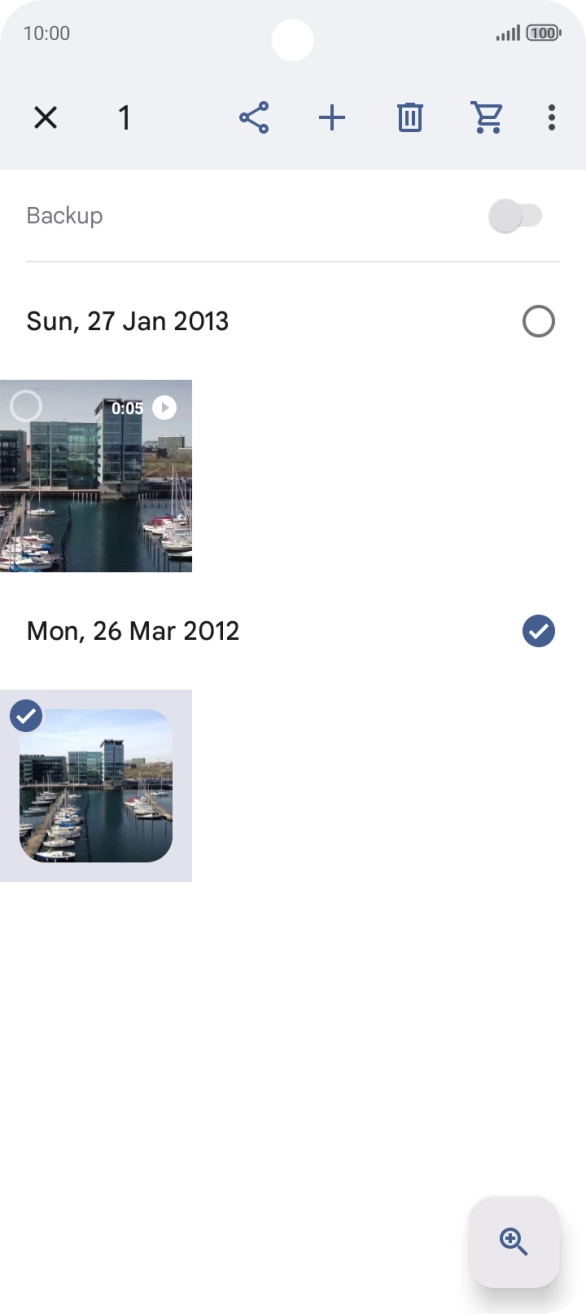 Press the required pictures or videos to select them.
