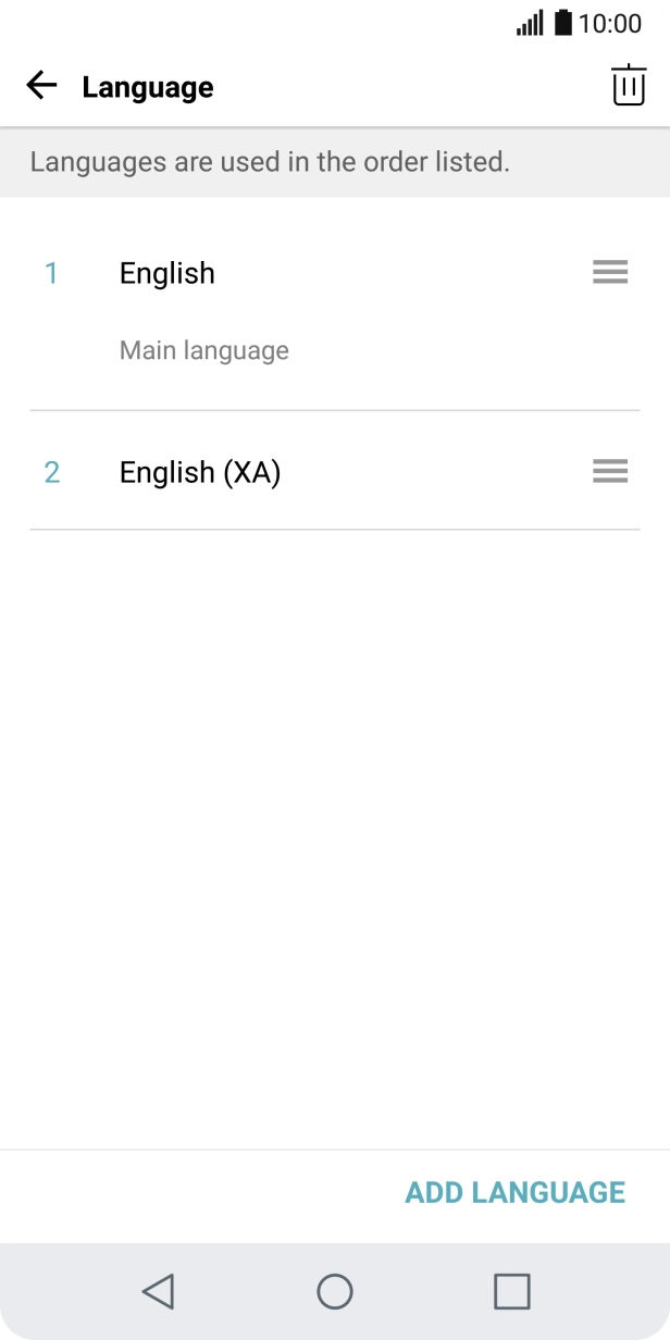 Press the move icon next to the required language and drag it to the top of the list.