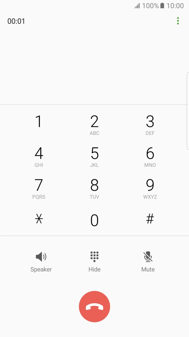 Press the end call icon.