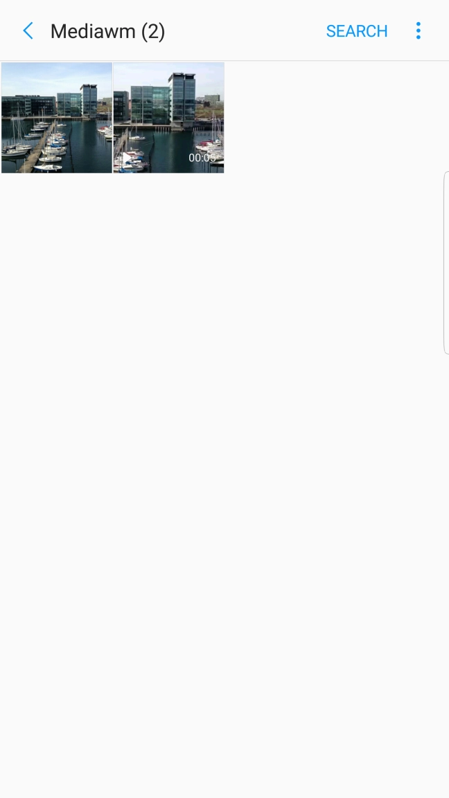 Go to the required folder and press the required picture or video clip.