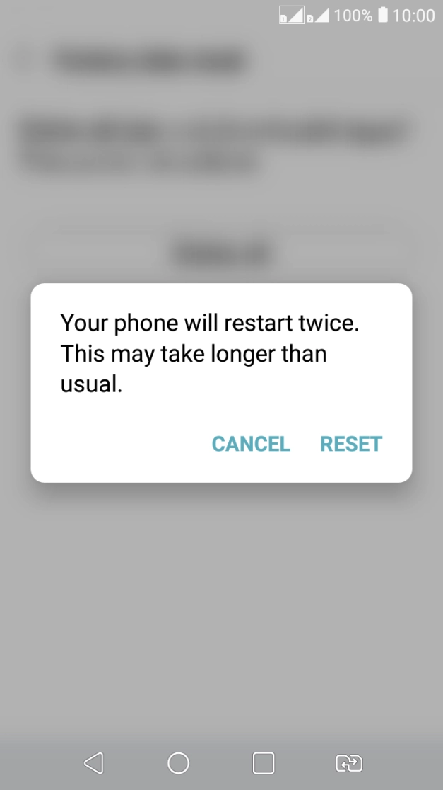Press RESET. Wait a moment while the factory default settings are restored. Follow the instructions on the screen to set up your phone and prepare it for use.