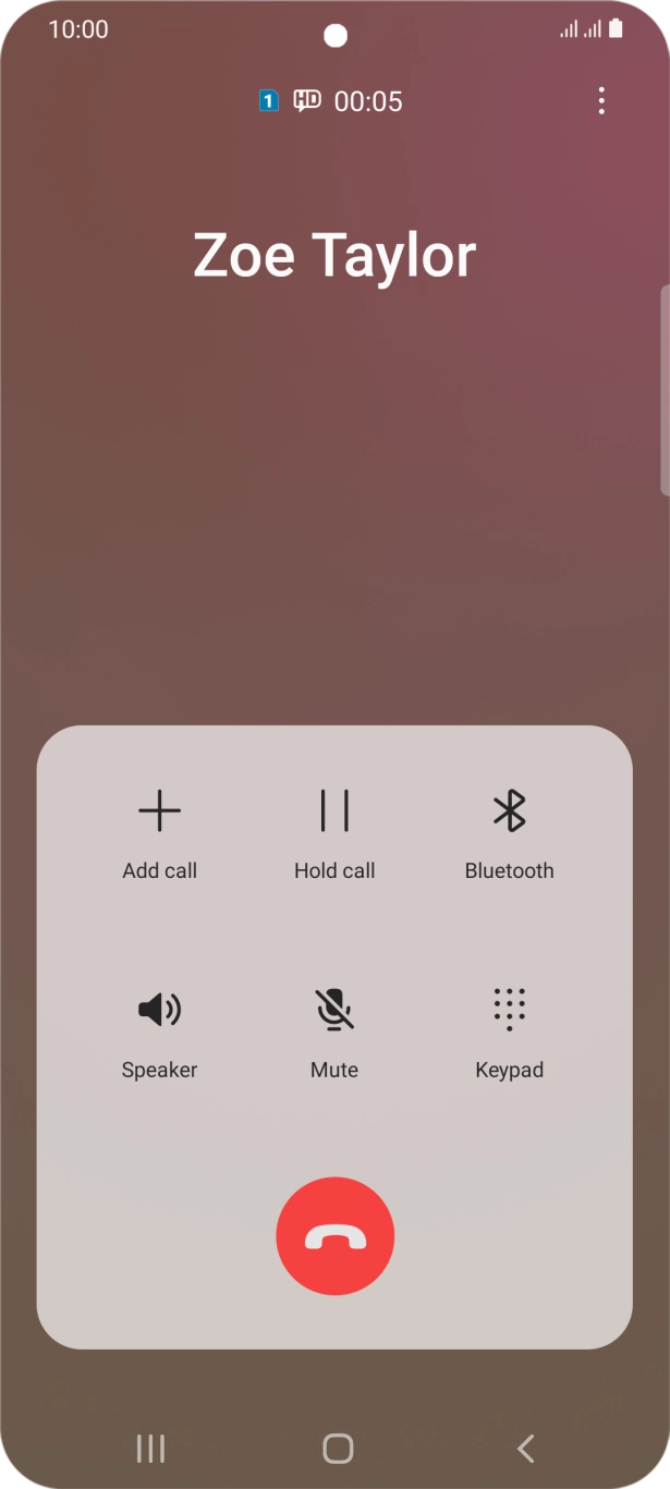 Press the end call icon.