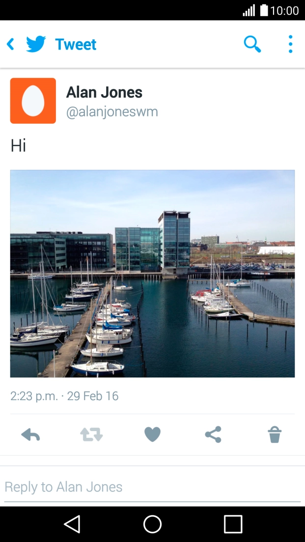 Press the reply icon.