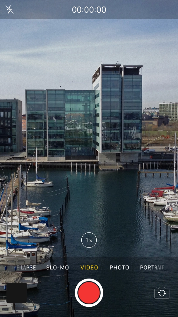 Slide your finger right or left on the screen to select PHOTO.