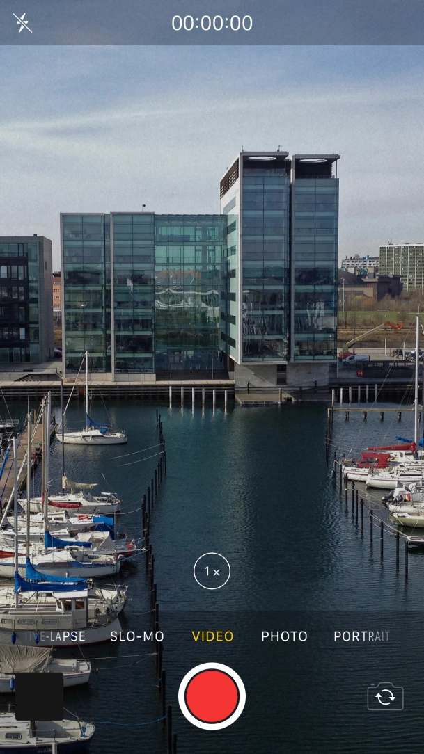 Slide your finger right or left on the screen to select PHOTO.