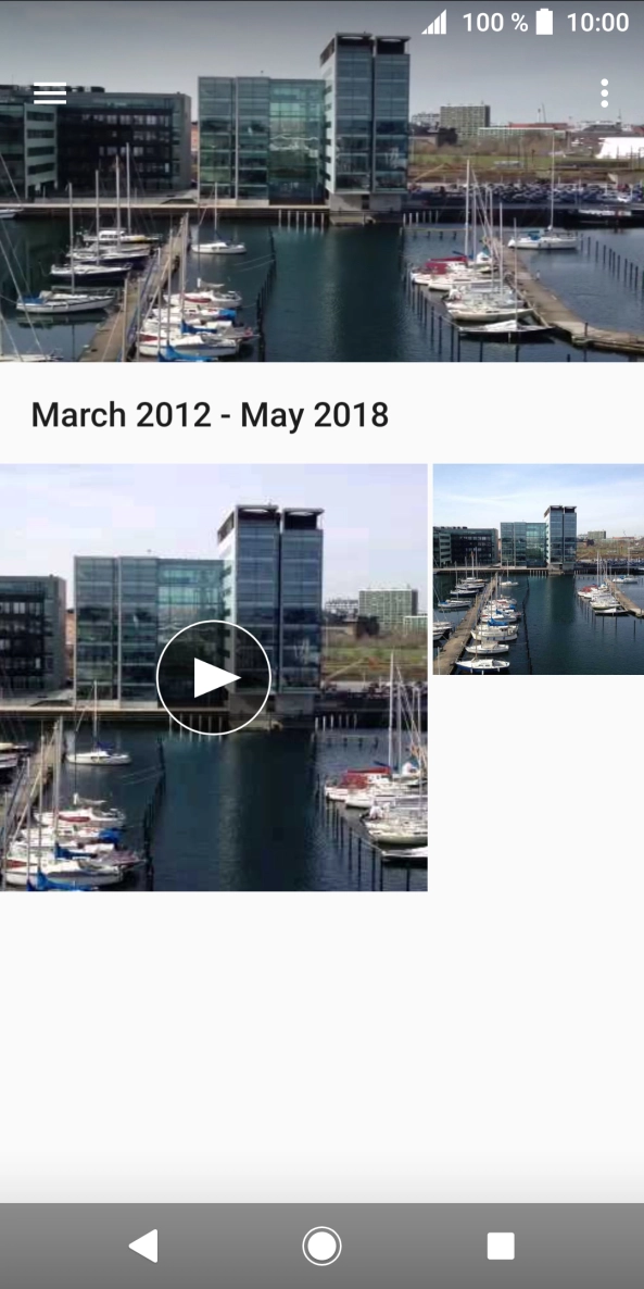Slide your finger right starting from the left side of the screen.
