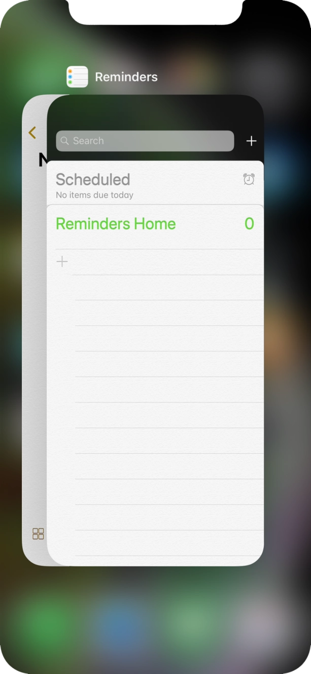 Slide upwards on the required application to end it.