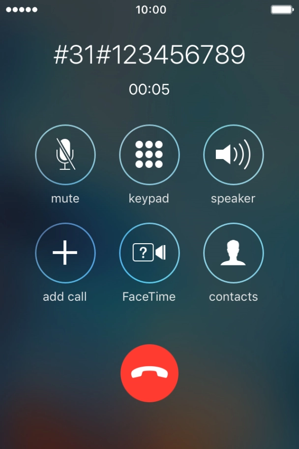 Press the end call icon.