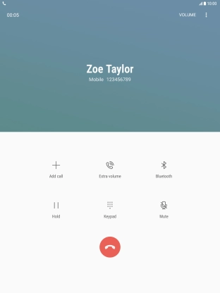 Press the end call icon.