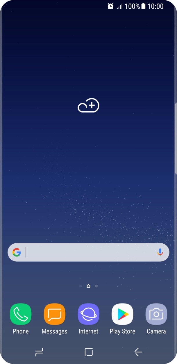 The alarm icon shows that the alarm is set.