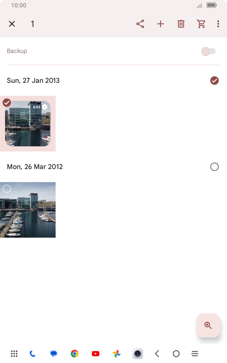 Press the required pictures or videos to select them.