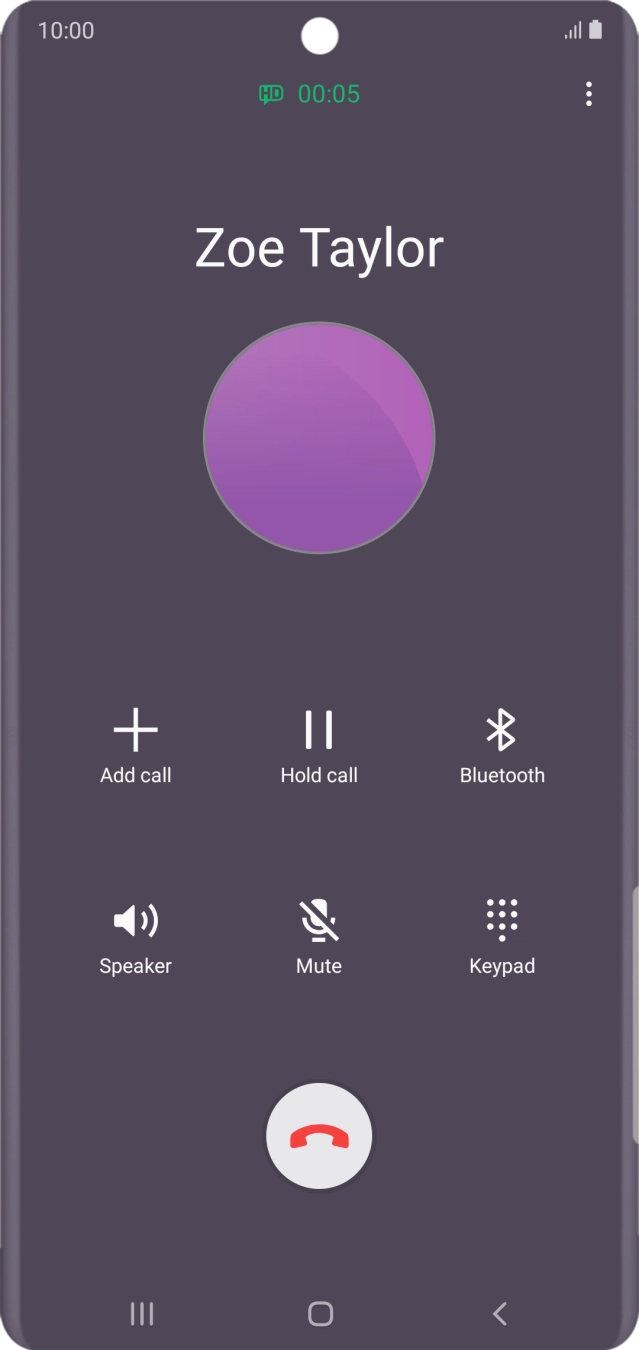 Press the end call icon.