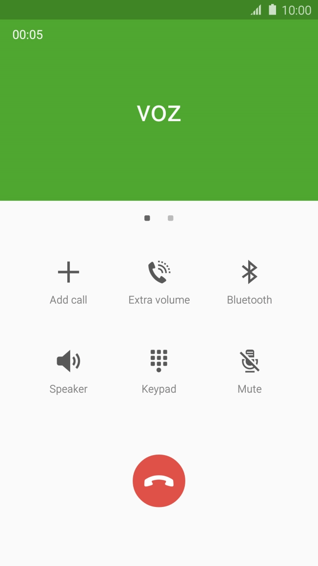 Press the end call icon.