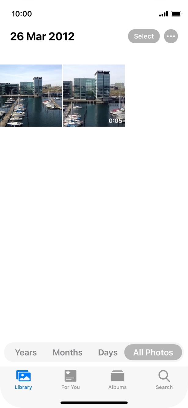 Go to the required folder and press the required picture or video clip.