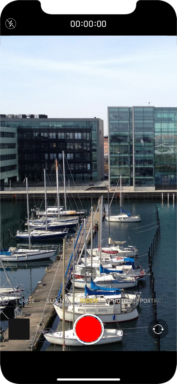 Slide your finger right or left on the screen to select PHOTO.