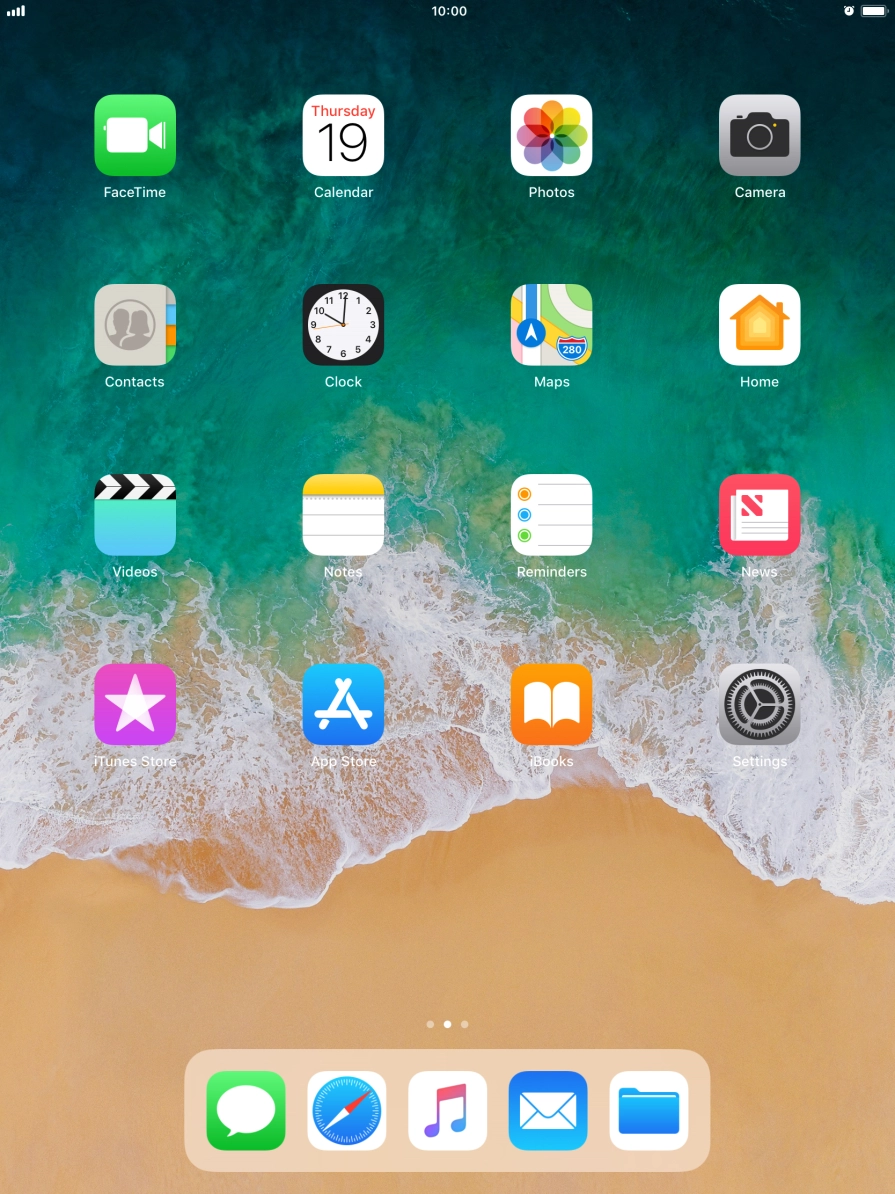 The alarm icon shows that the alarm is set.