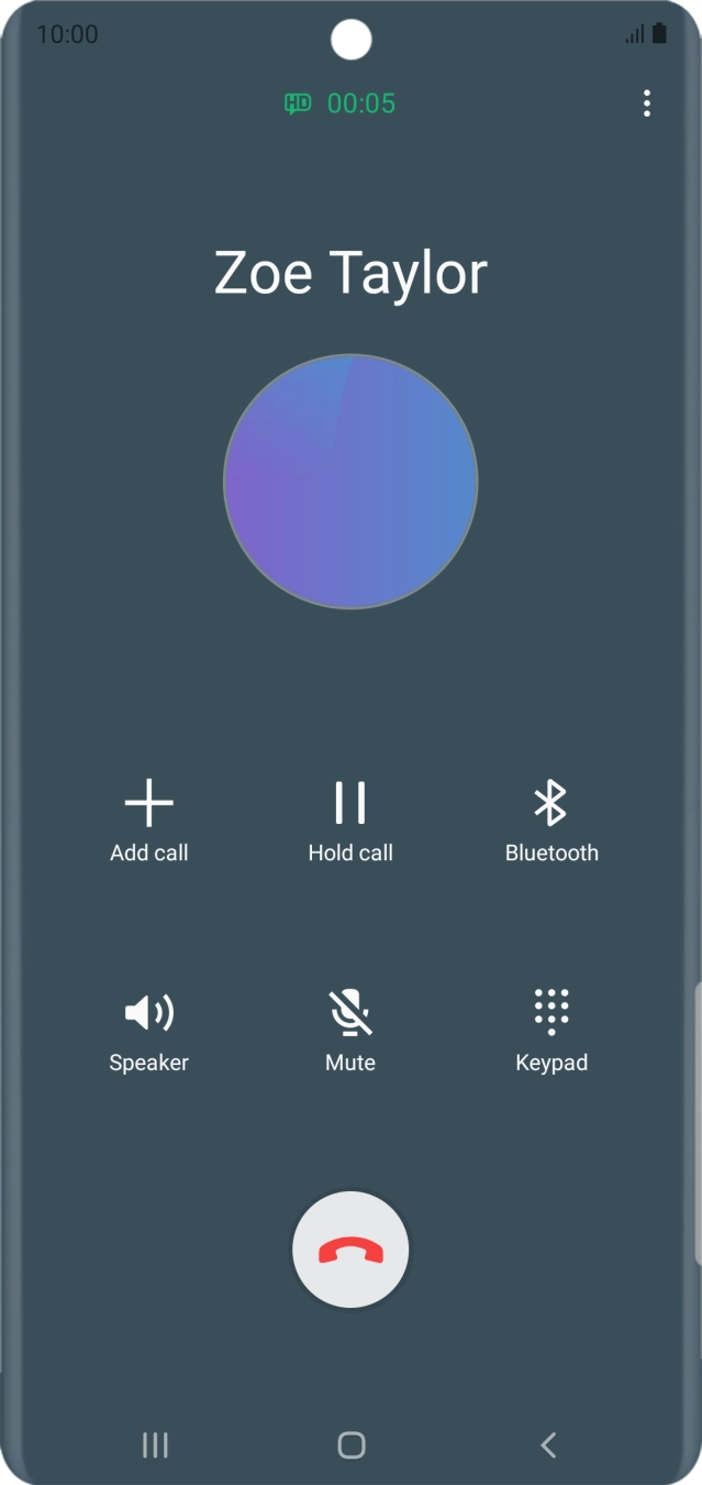 Press the end call icon.