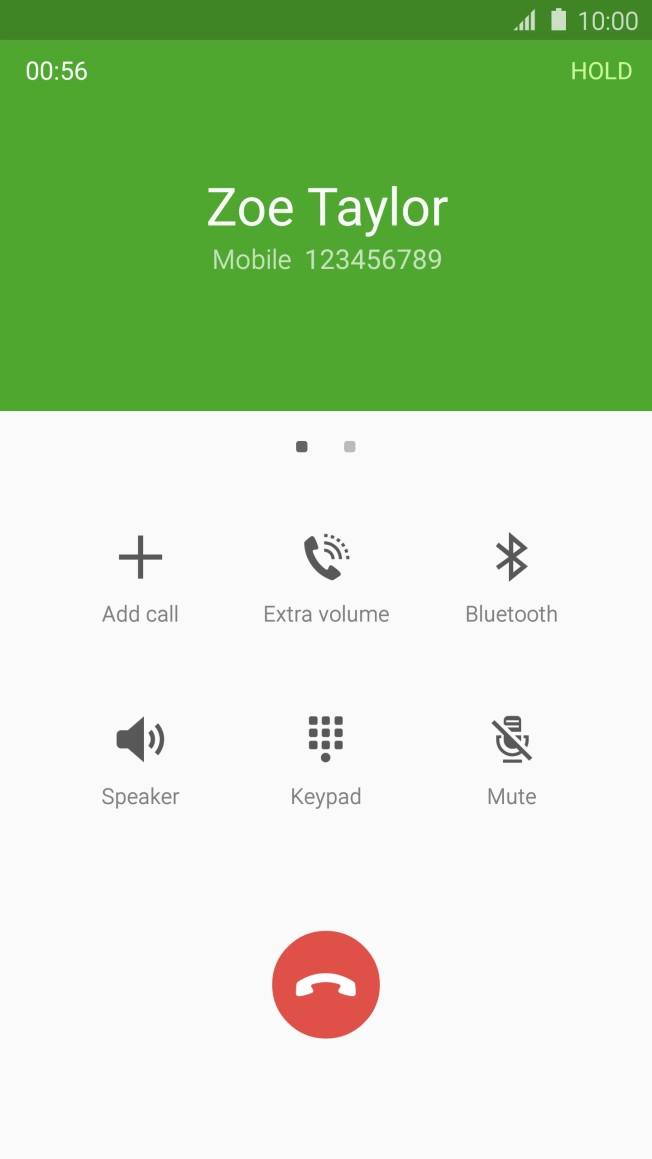 Press the end call icon to end the other call.