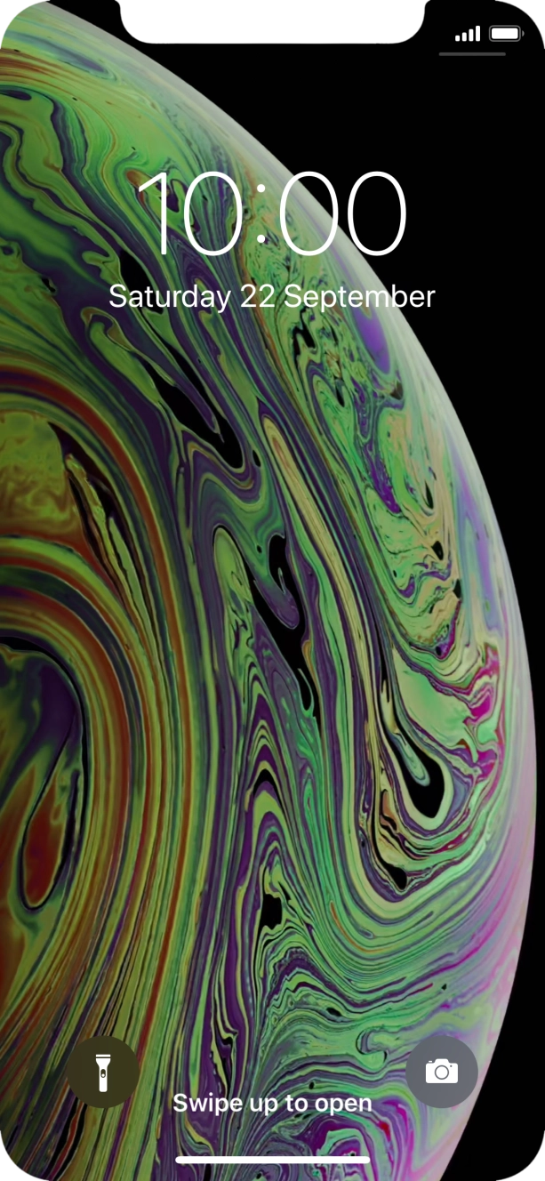 Slide your finger upwards starting from the bottom of the screen.