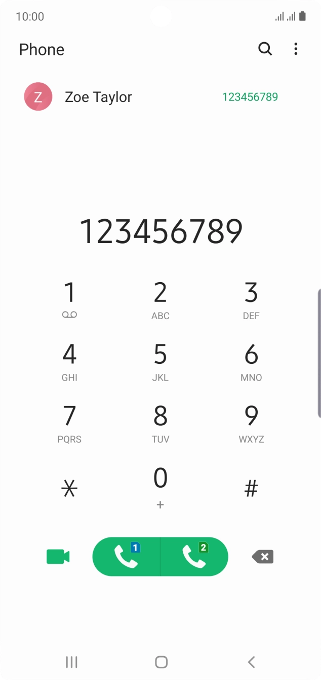 Key in the required number and press the call icon next to the required SIM.