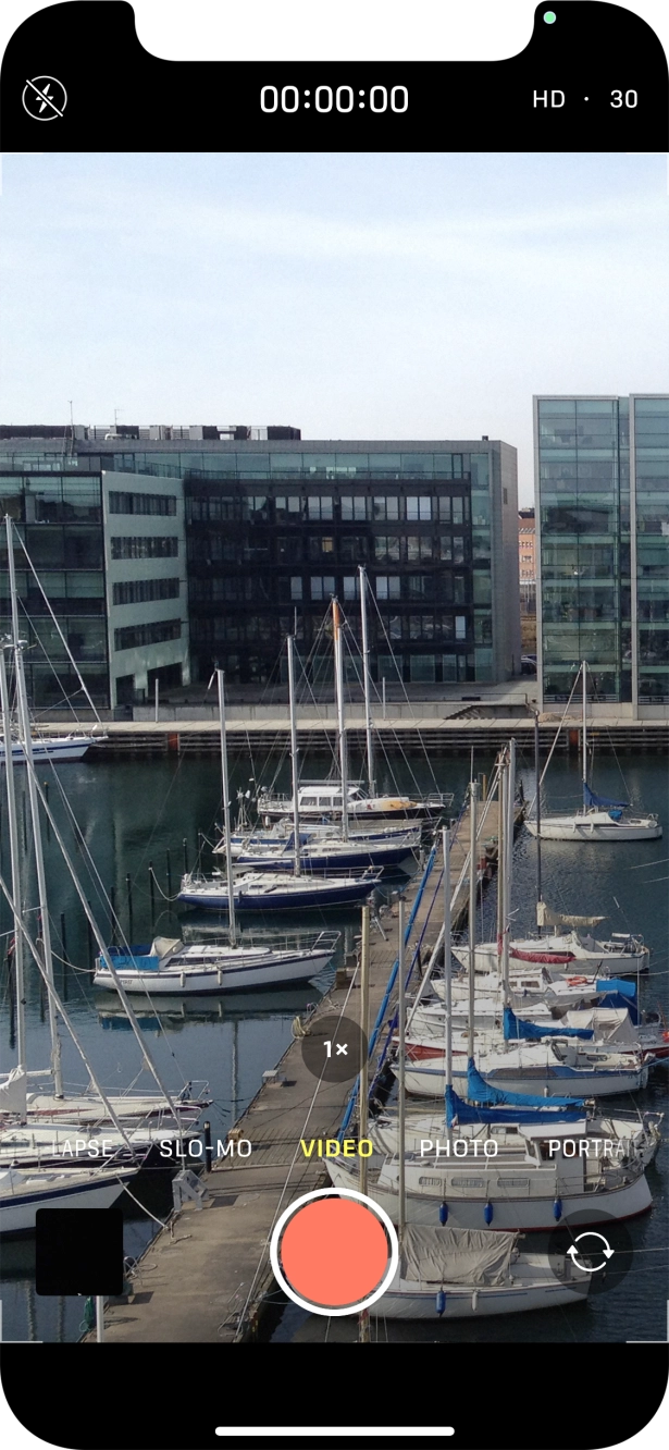 Slide your finger right or left on the screen to select PHOTO.