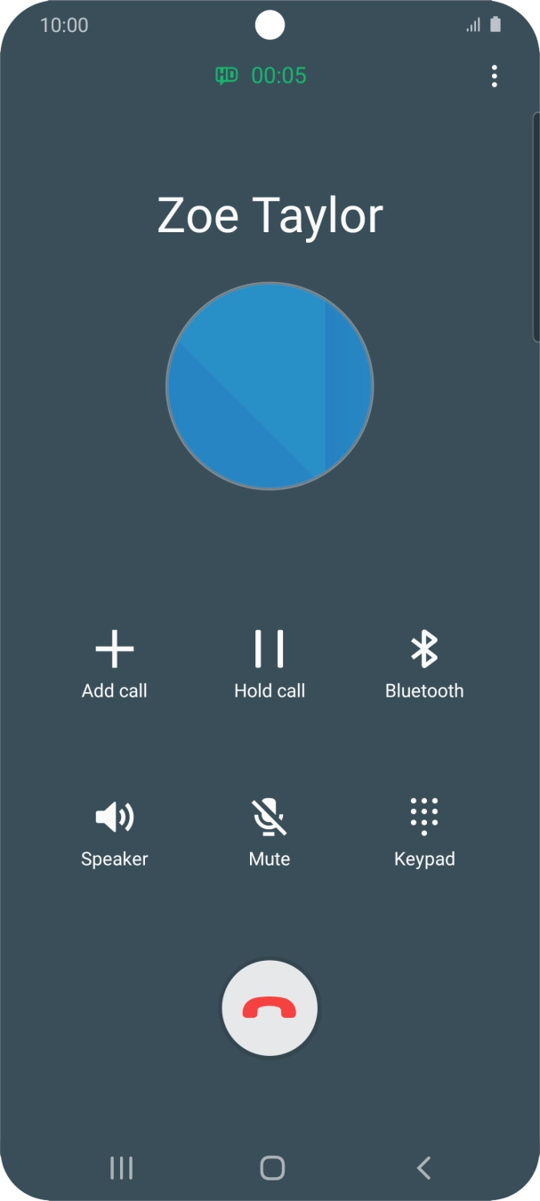 Press the end call icon.