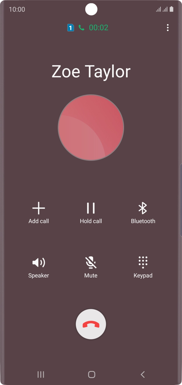 Press the end call icon.