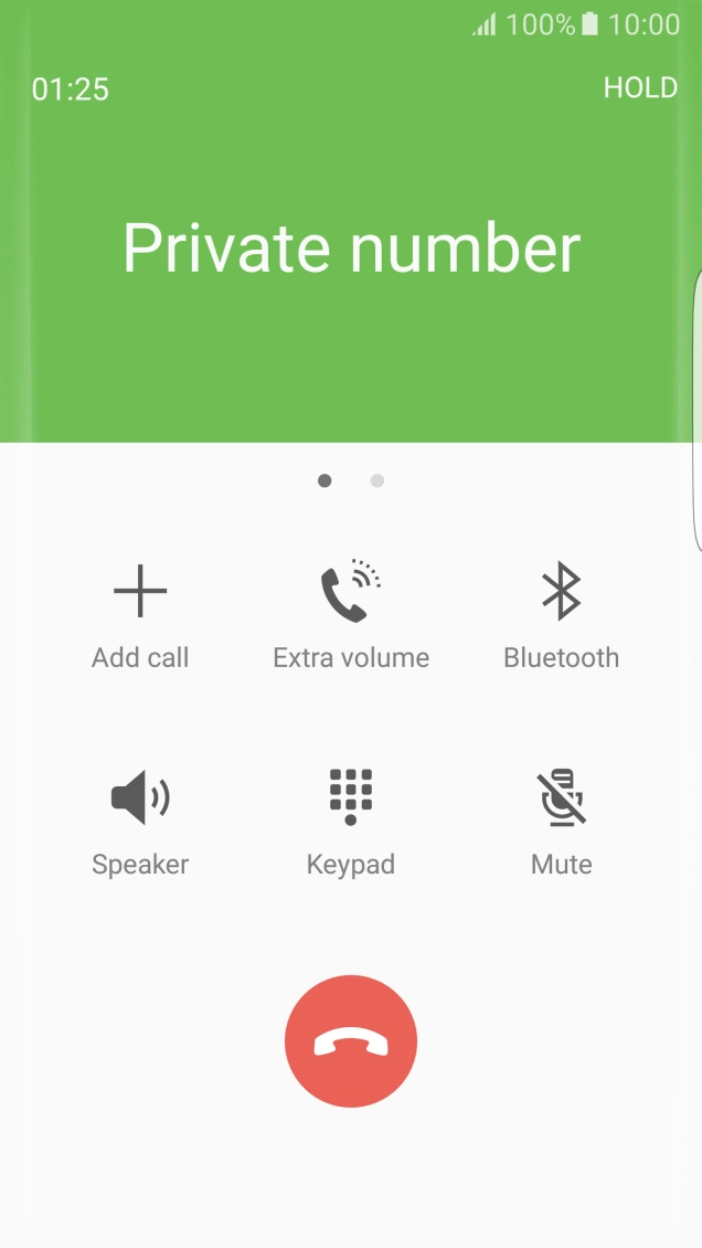 Press the end call icon to end the other call.