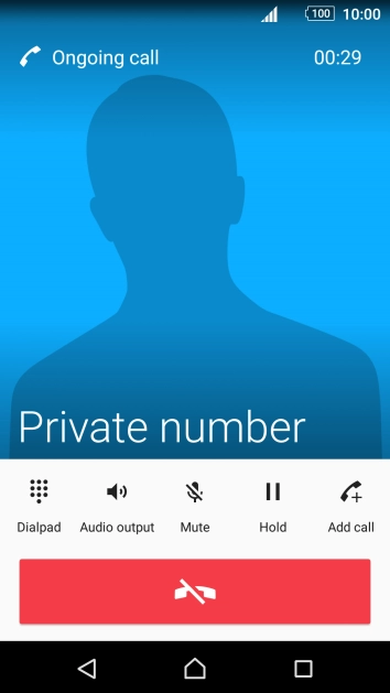 Press the end call icon to end the other call.
