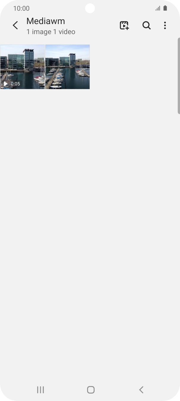 Press and hold any picture or video clip.