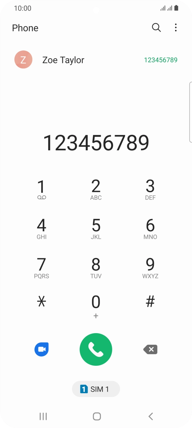 Key in the required number and press the call icon next to the required SIM.