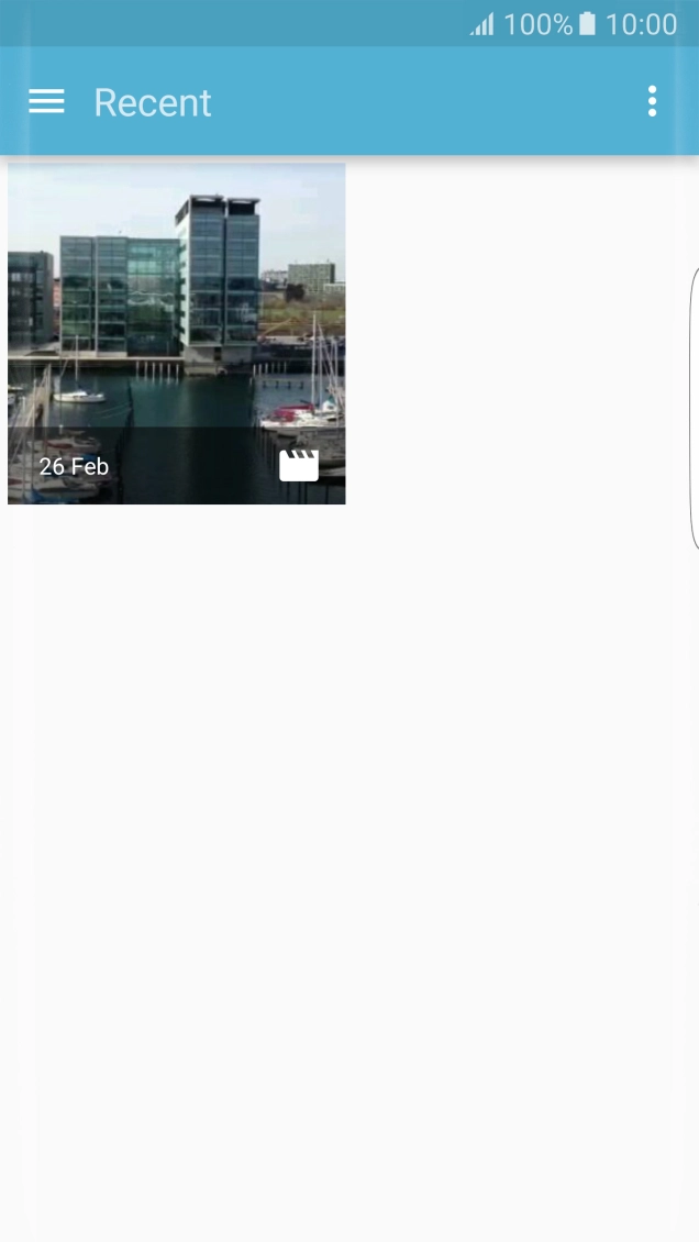 Slide your finger right starting from the left side of the screen.