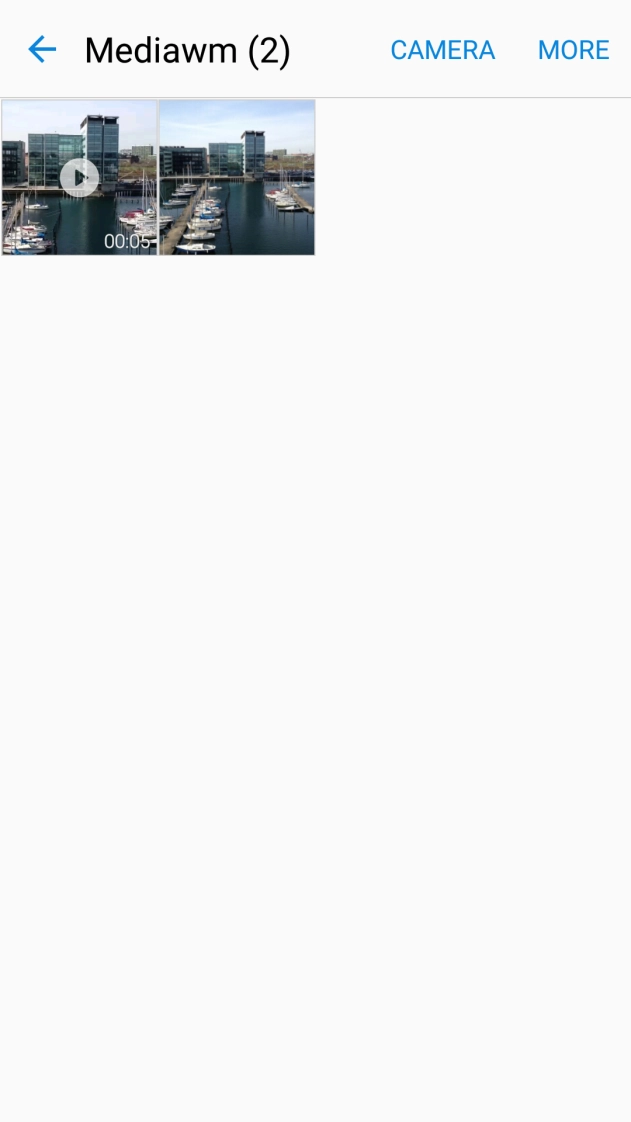 Press and hold any picture or video clip.